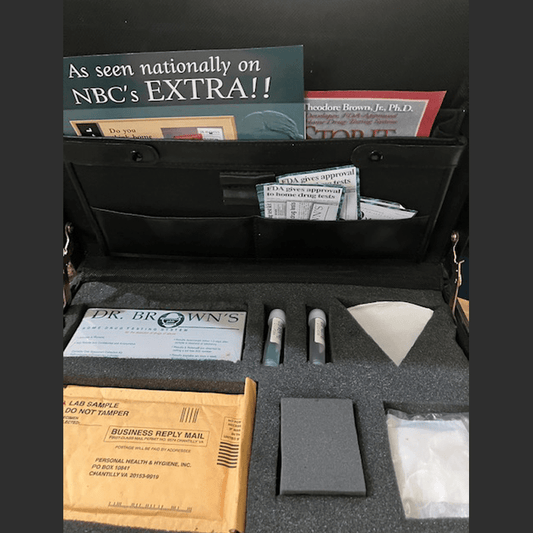 Dr.Brown's home drug testing kit, briefcase view with urine samples